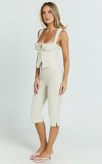 Susannah Cream Pinstripe Split-Hem Cropped Trousers – Tailored Elegance in Motion