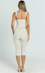 Susannah Cream Pinstripe Split-Hem Cropped Trousers – Tailored Elegance in Motion
